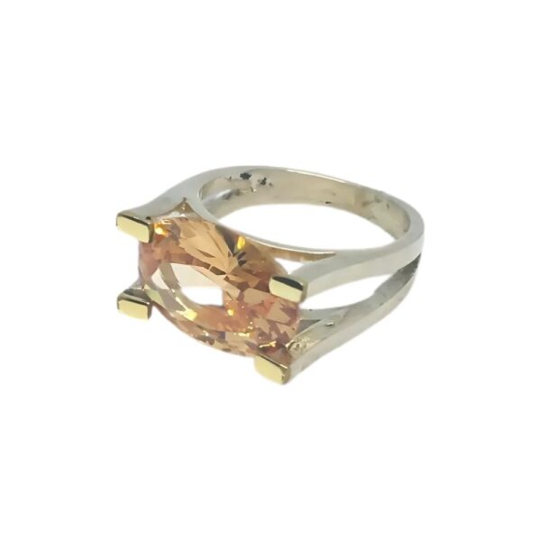 ANILLO PIEDRA CENTRAL PLATA Y ORO