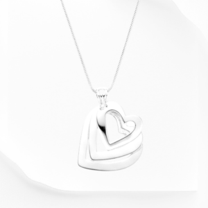 DIJE FIGURA CORAZÓN TRIPLE